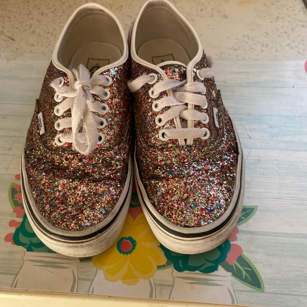 Size 8 Pink glitter Vans sneakers . Good condition .